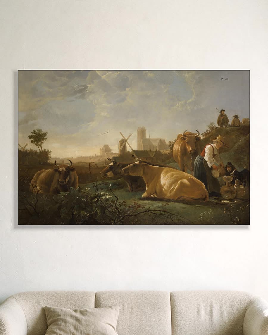 Gezicht op Dordrecht met vee aan de rivier in een aluminium frame aan dezelfde muur