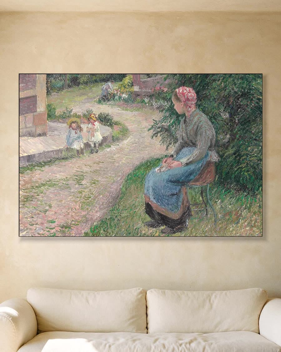 Zittende dienstmeid in de tuin van Éragny in een aluminium frame aan dezelfde muur
