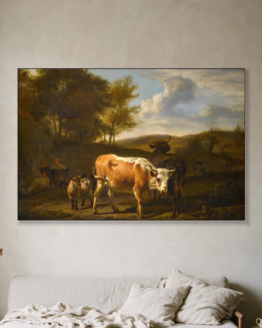 Berglandschap met koeien in een aluminium frame aan dezelfde muur