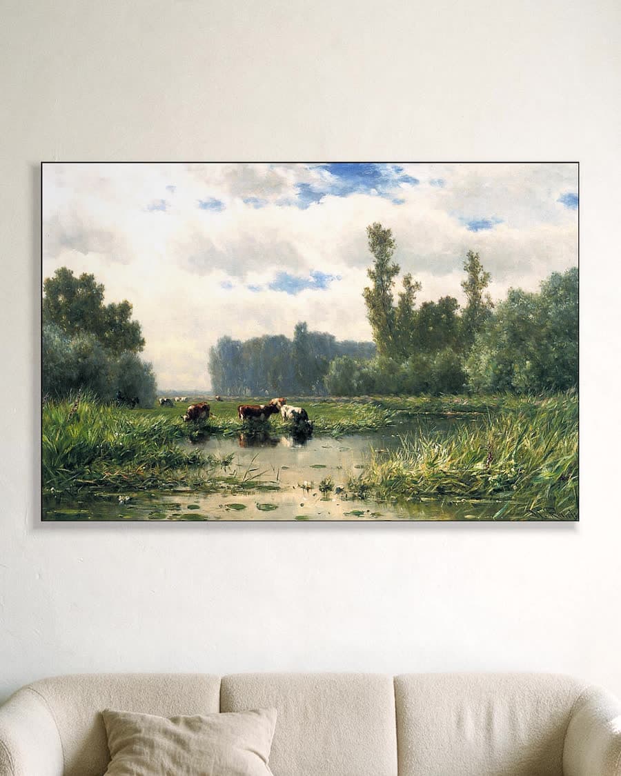Koeien aan de waterkant in een aluminium frame aan dezelfde muur