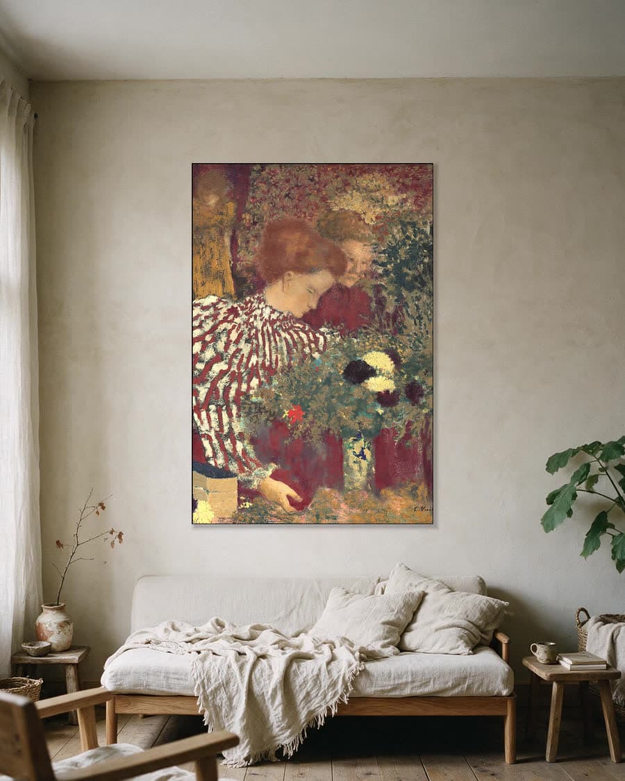 De gestreepte blouse in een aluminium frame aan dezelfde muur