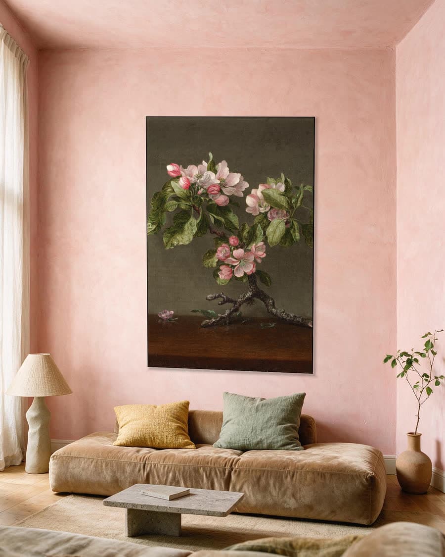 Appelbloesem in een aluminium frame aan dezelfde muur