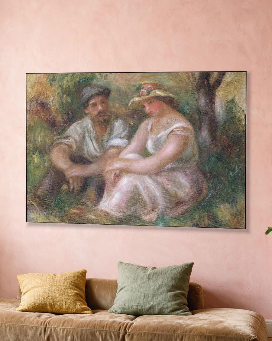 Het gesprek in een aluminium frame aan dezelfde muur