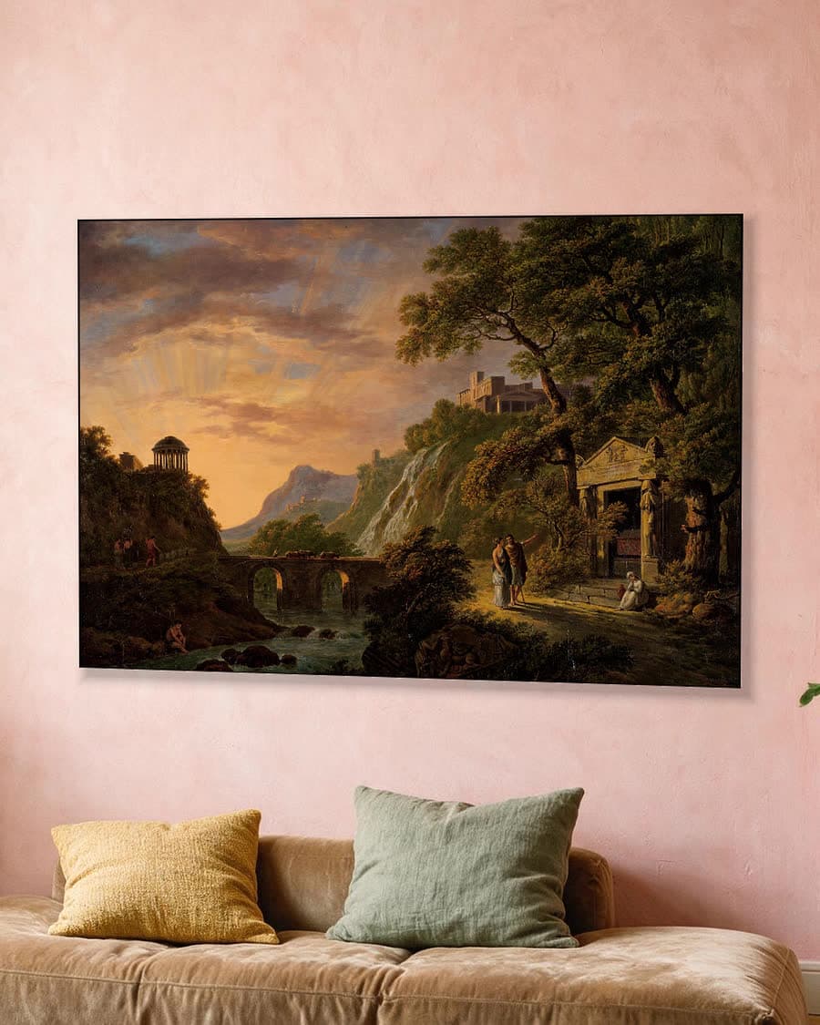 Arcadisch landschap met ondergaande zon in een aluminium frame aan dezelfde muur