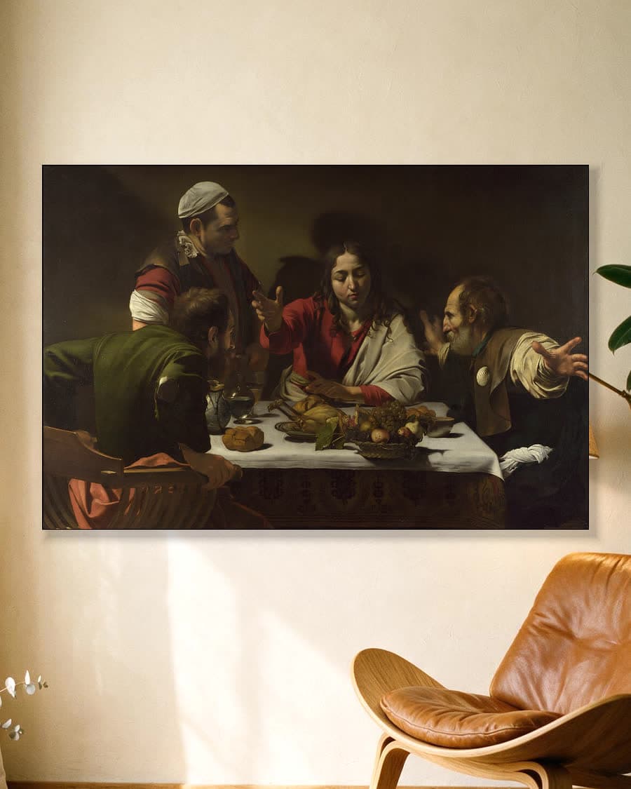 De maaltijd in Emmaüs in een aluminium frame aan dezelfde muur