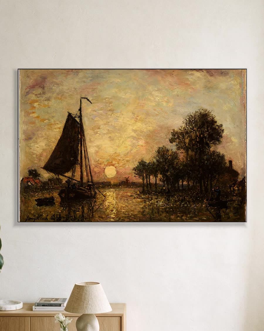 Avondgloed boven het water in een aluminium frame aan dezelfde muur