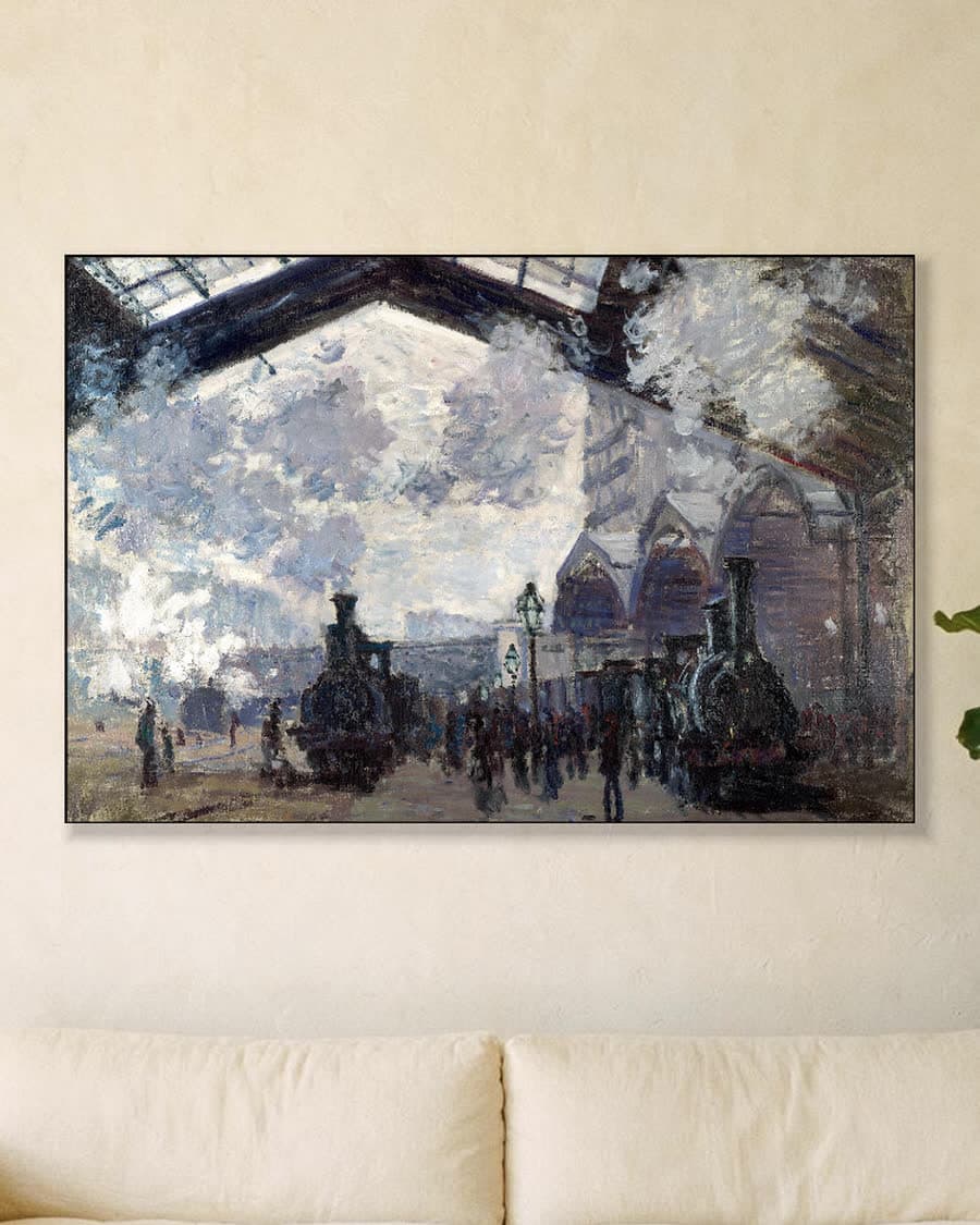 Het Gare Saint-Lazare in een aluminium frame aan dezelfde muur