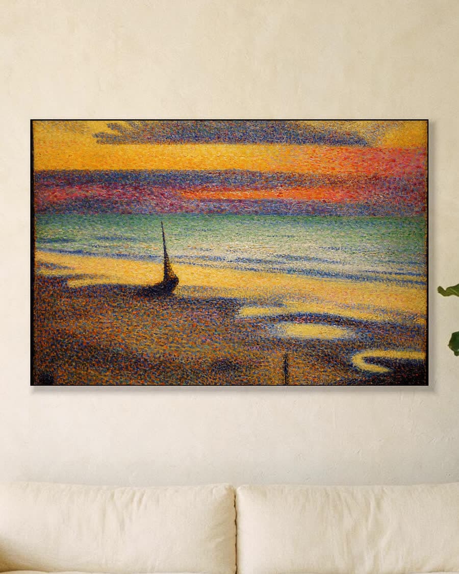 Het strand van Heist in een aluminium frame aan dezelfde muur