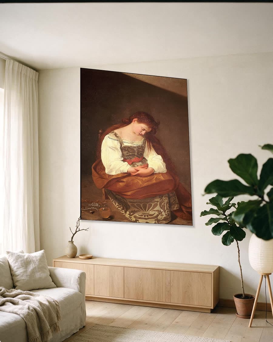 De boetvaardige Magdalena in een aluminium frame aan dezelfde muur