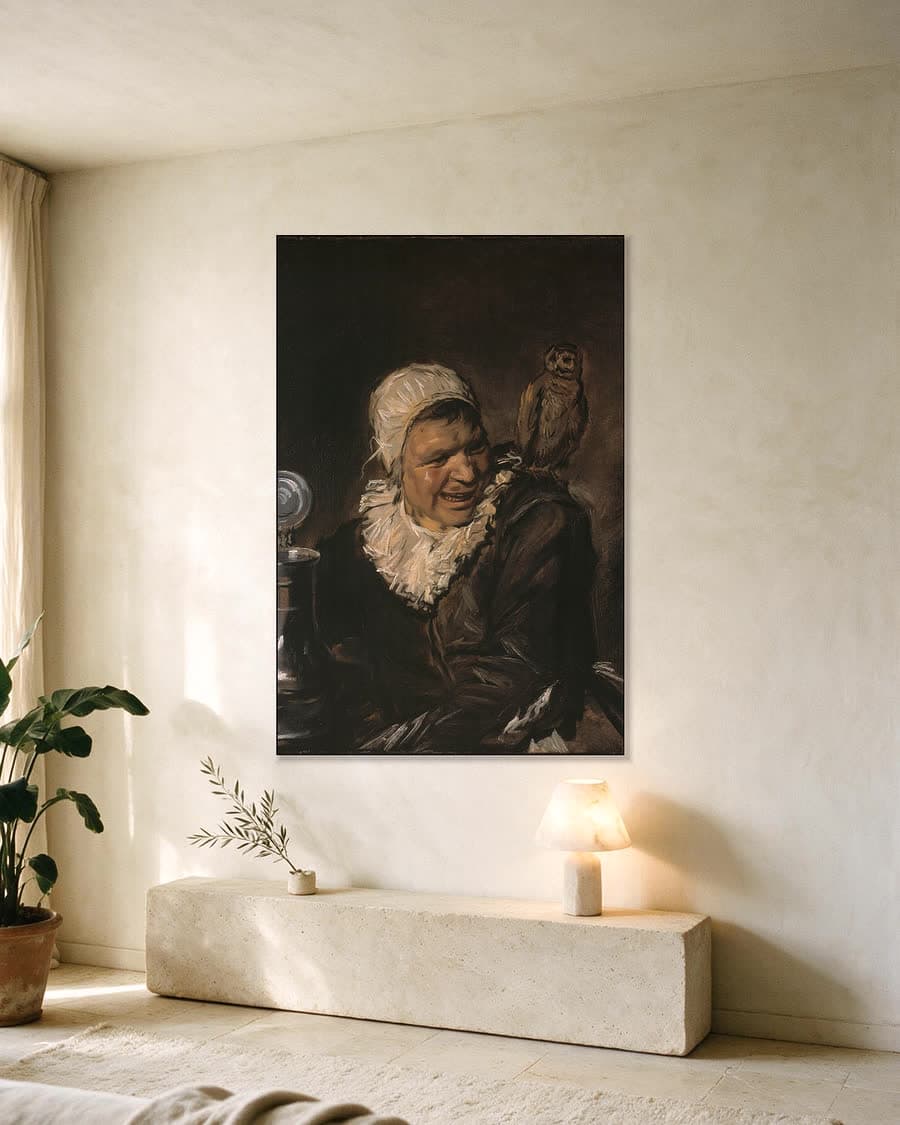 Malle Babbe in een aluminium frame aan dezelfde muur