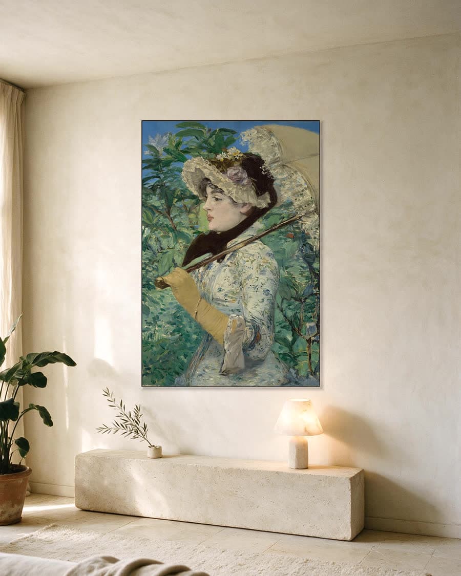 De lente (Jeanne Demarsy) in een aluminium frame aan dezelfde muur