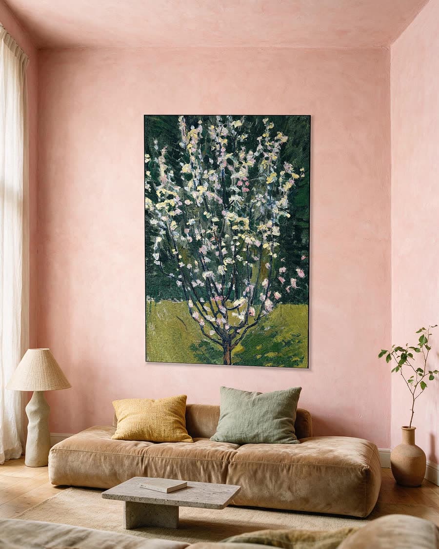 Bloeiend boompje in een aluminium frame aan dezelfde muur