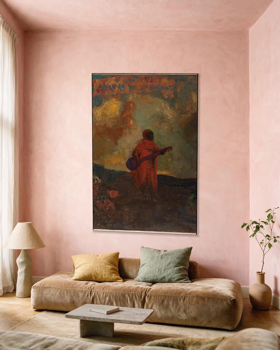 De Reizende Muzikant in een aluminium frame aan dezelfde muur