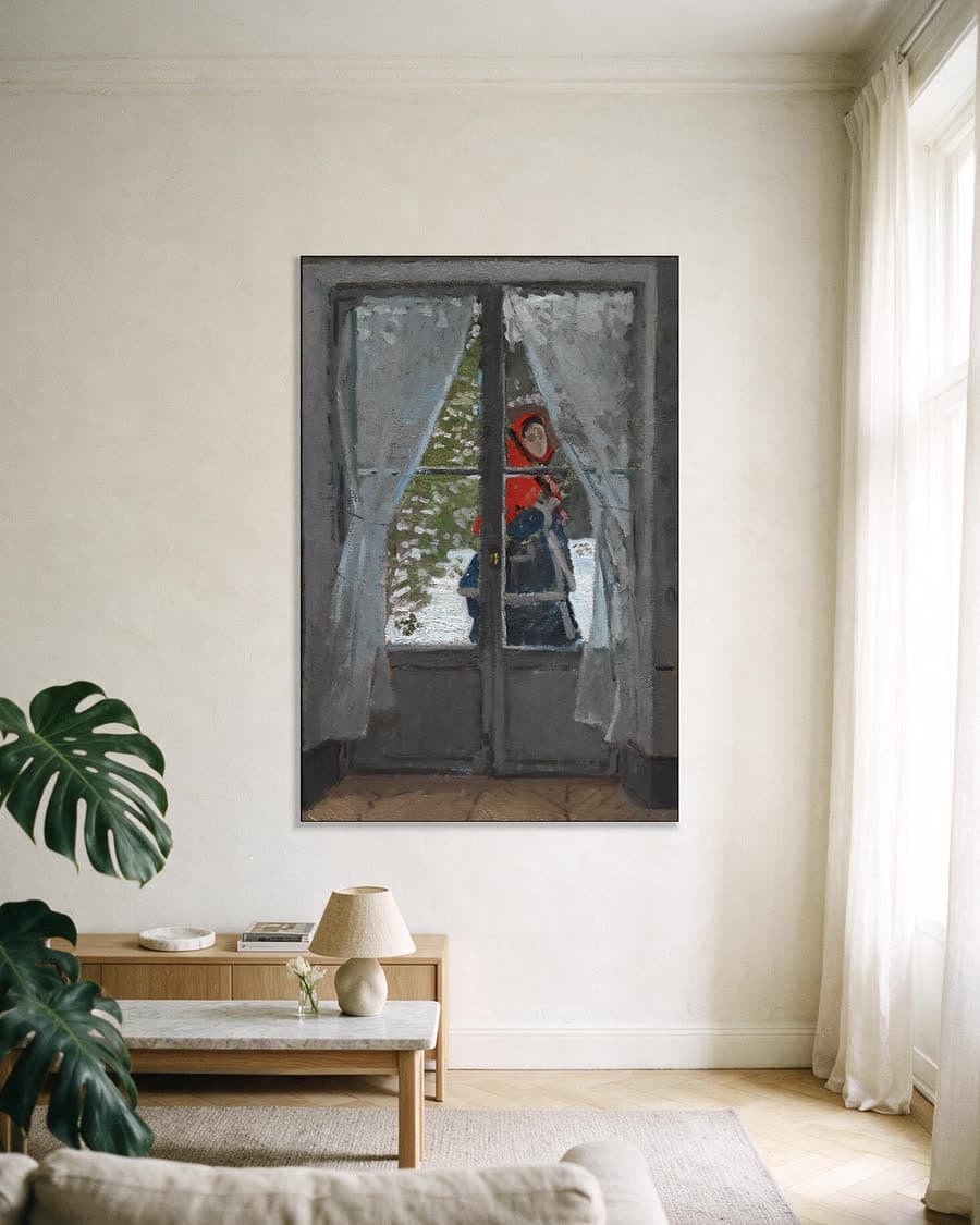 De rode hoofddoek in een aluminium frame aan dezelfde muur