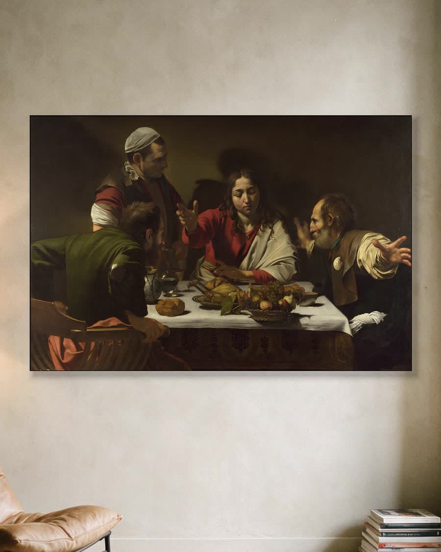 De maaltijd in Emmaüs in een aluminium frame aan dezelfde muur