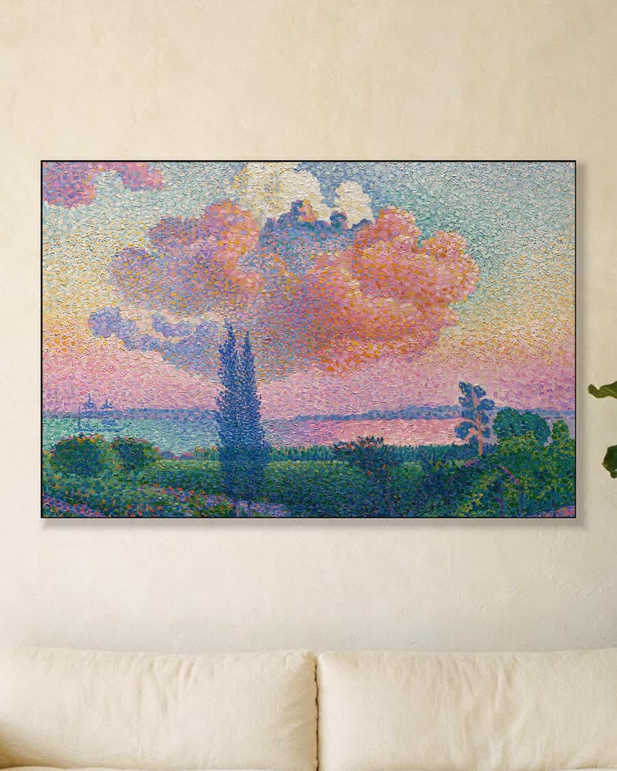 De roze wolk in een aluminium frame aan dezelfde muur