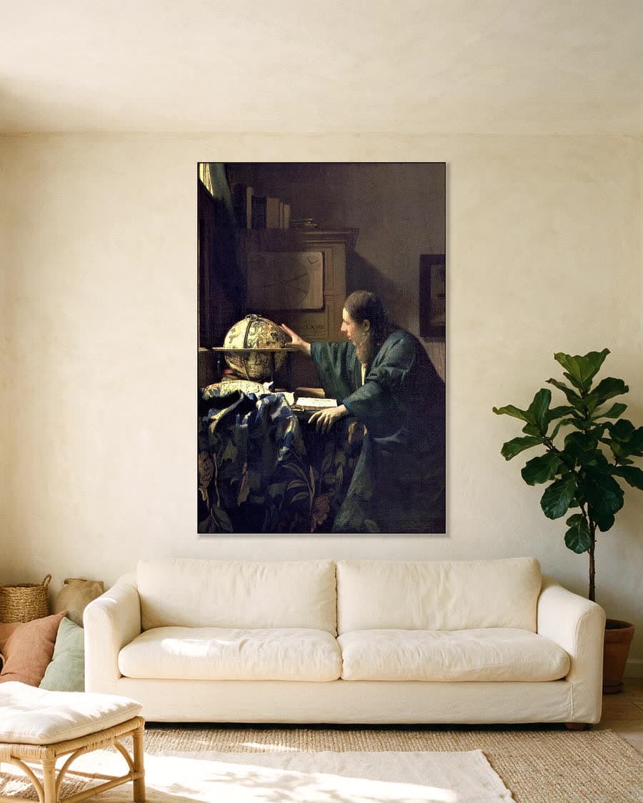 De Astronoom in een aluminium frame aan dezelfde muur