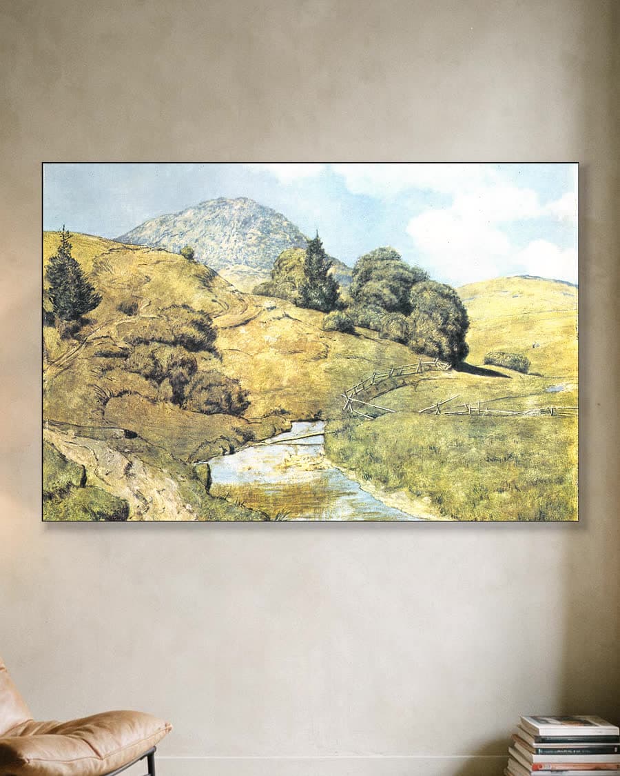 Berglandschap met kabbelende beek in een aluminium frame aan dezelfde muur