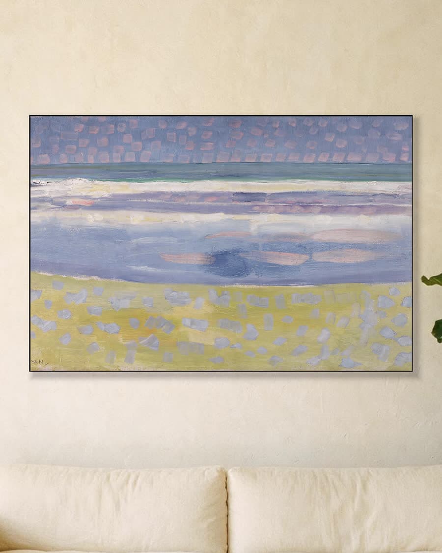 Zee na zonsondergang in een aluminium frame aan dezelfde muur