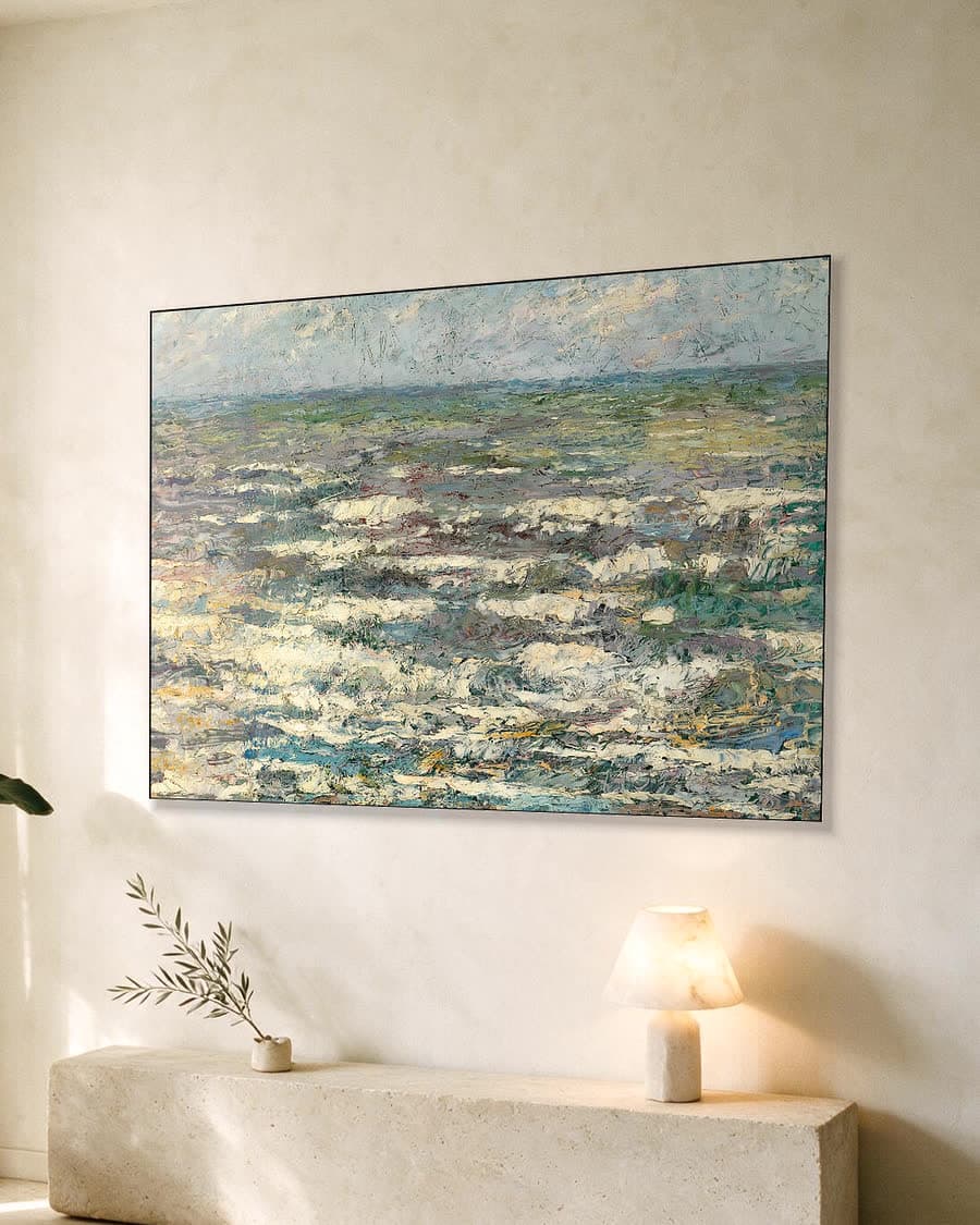 De zee bij Katwijk in een aluminium frame aan dezelfde muur