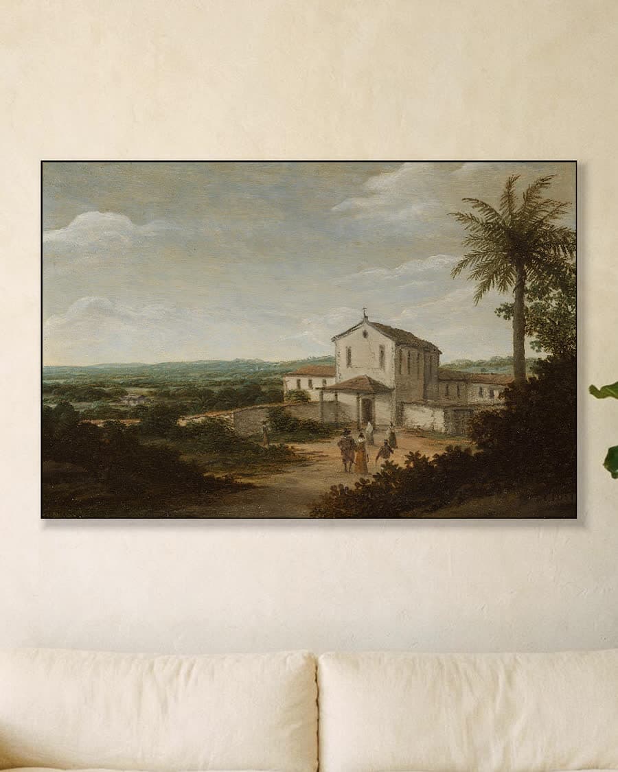 Landelijk tafereel met kerk in een aluminium frame aan dezelfde muur
