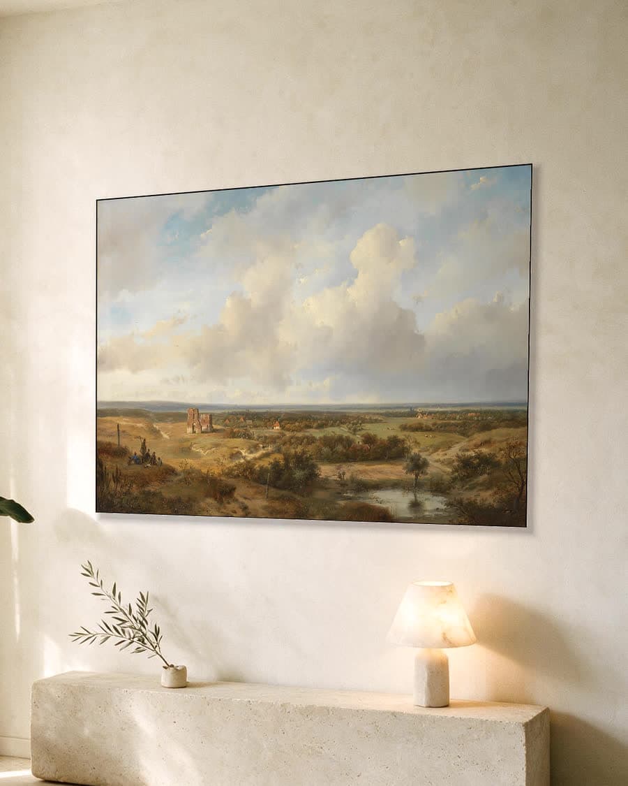 Duingezicht met de ruïne van kasteel Brederode bij Santpoort in een aluminium frame aan dezelfde muur
