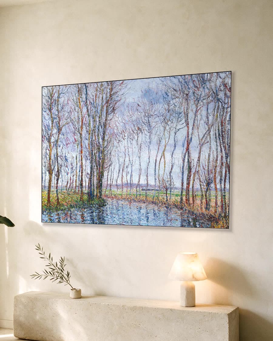 Bomen langs het water in een aluminium frame aan dezelfde muur