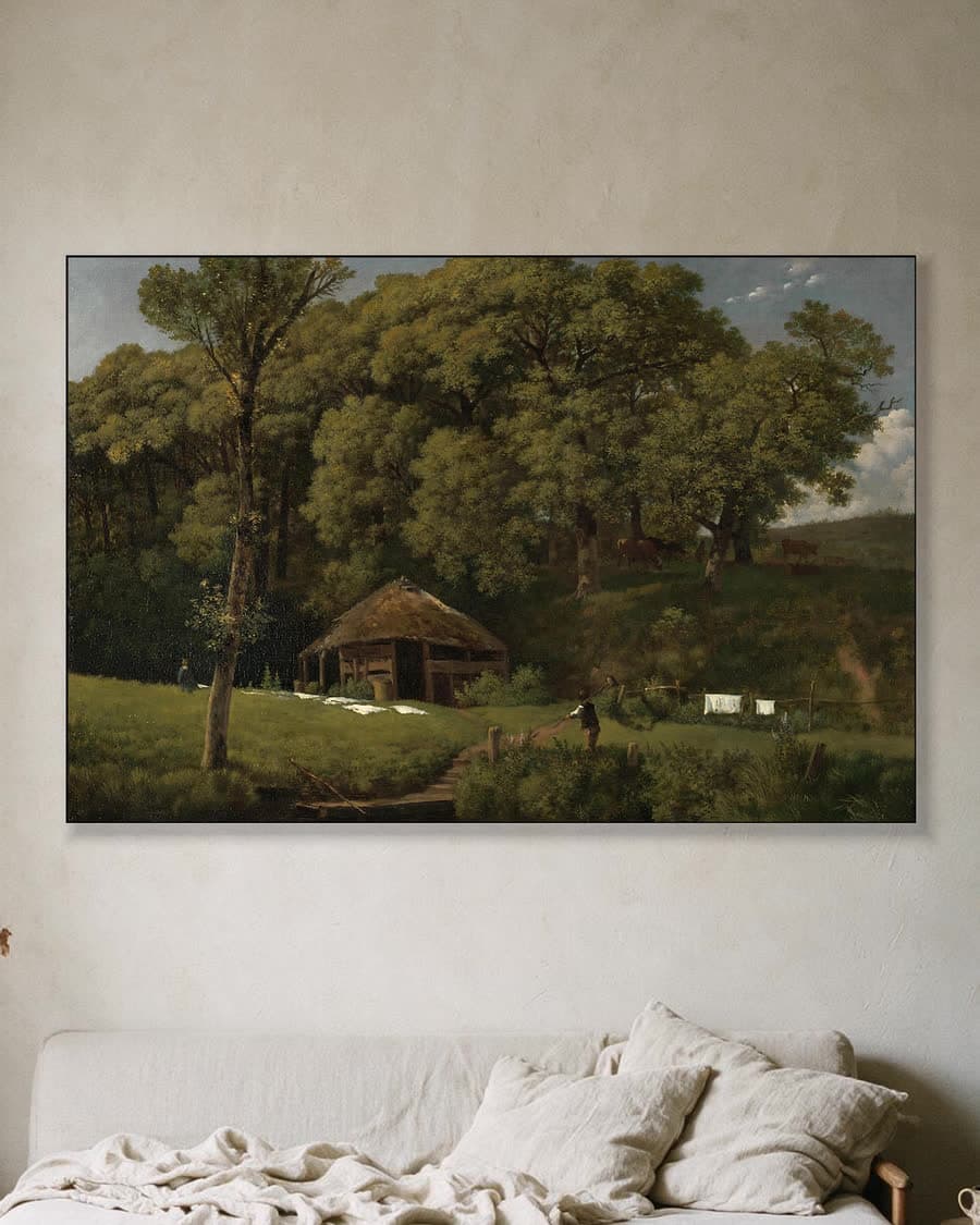 Een bouwhoeve aan de oever van een beek in Gelderland in een aluminium frame aan dezelfde muur
