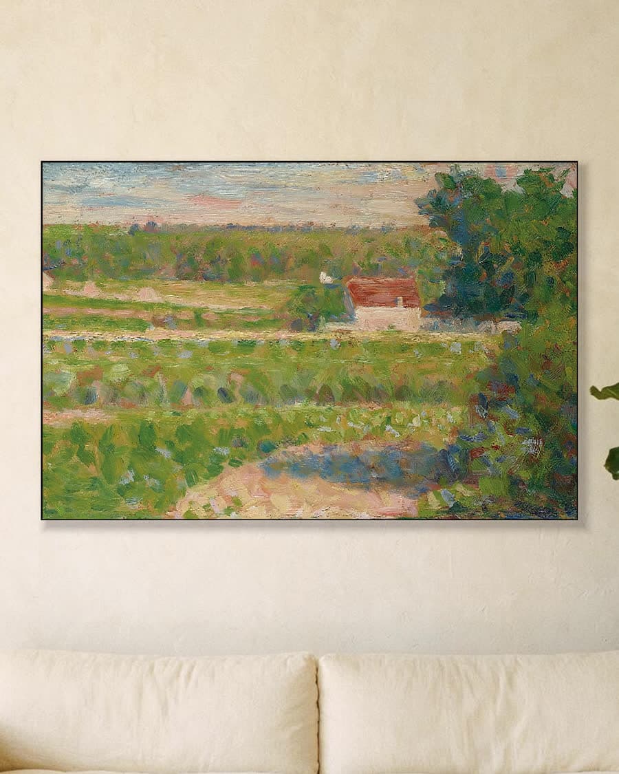 Het huis met het rode dak in een aluminium frame aan dezelfde muur