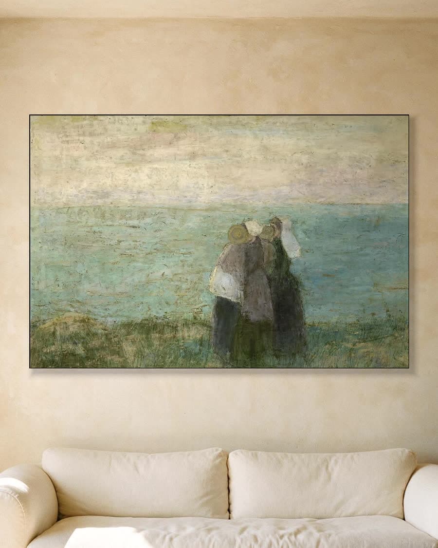 Vrouwen aan zee in een aluminium frame aan dezelfde muur