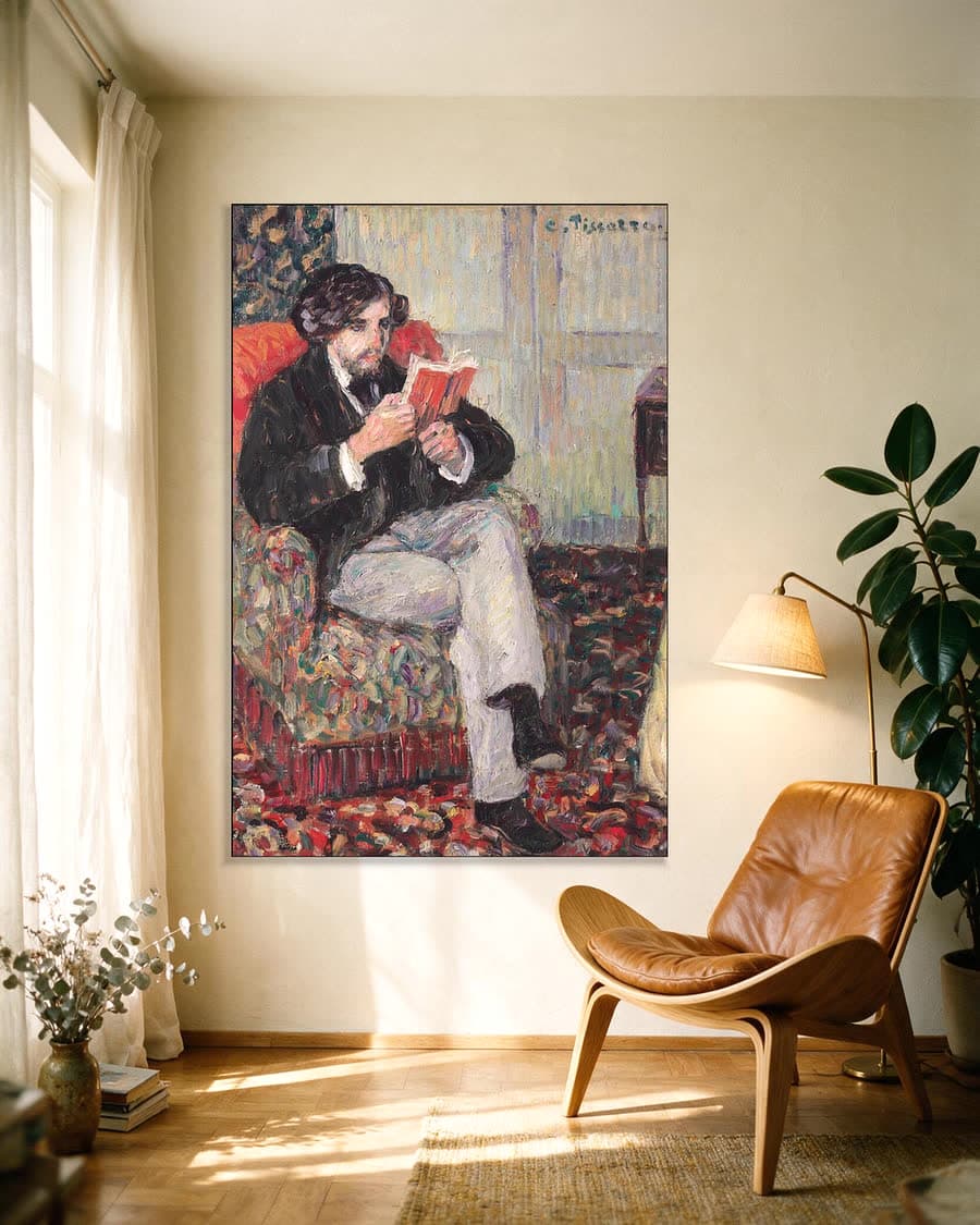 Lezende Félix Pissarro in een aluminium frame aan dezelfde muur