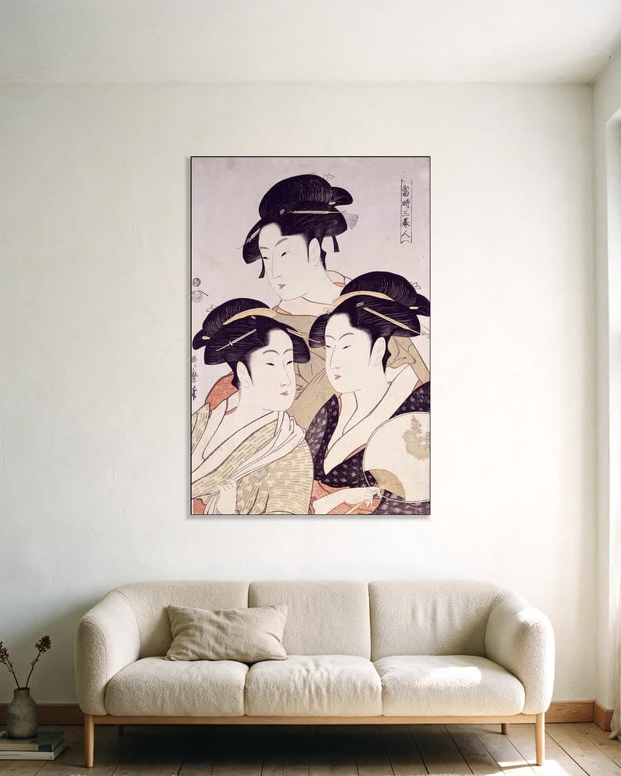 Drie schoonheden in een aluminium frame aan dezelfde muur