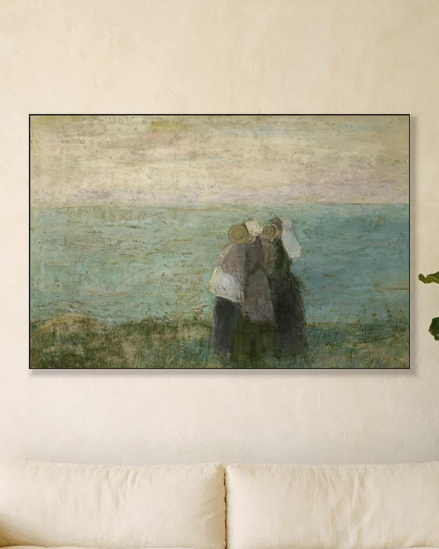 Vrouwen aan zee in een aluminium frame aan dezelfde muur