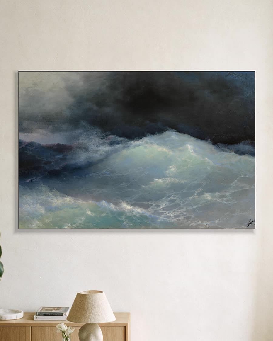Hoge golven op open zee in een aluminium frame aan dezelfde muur