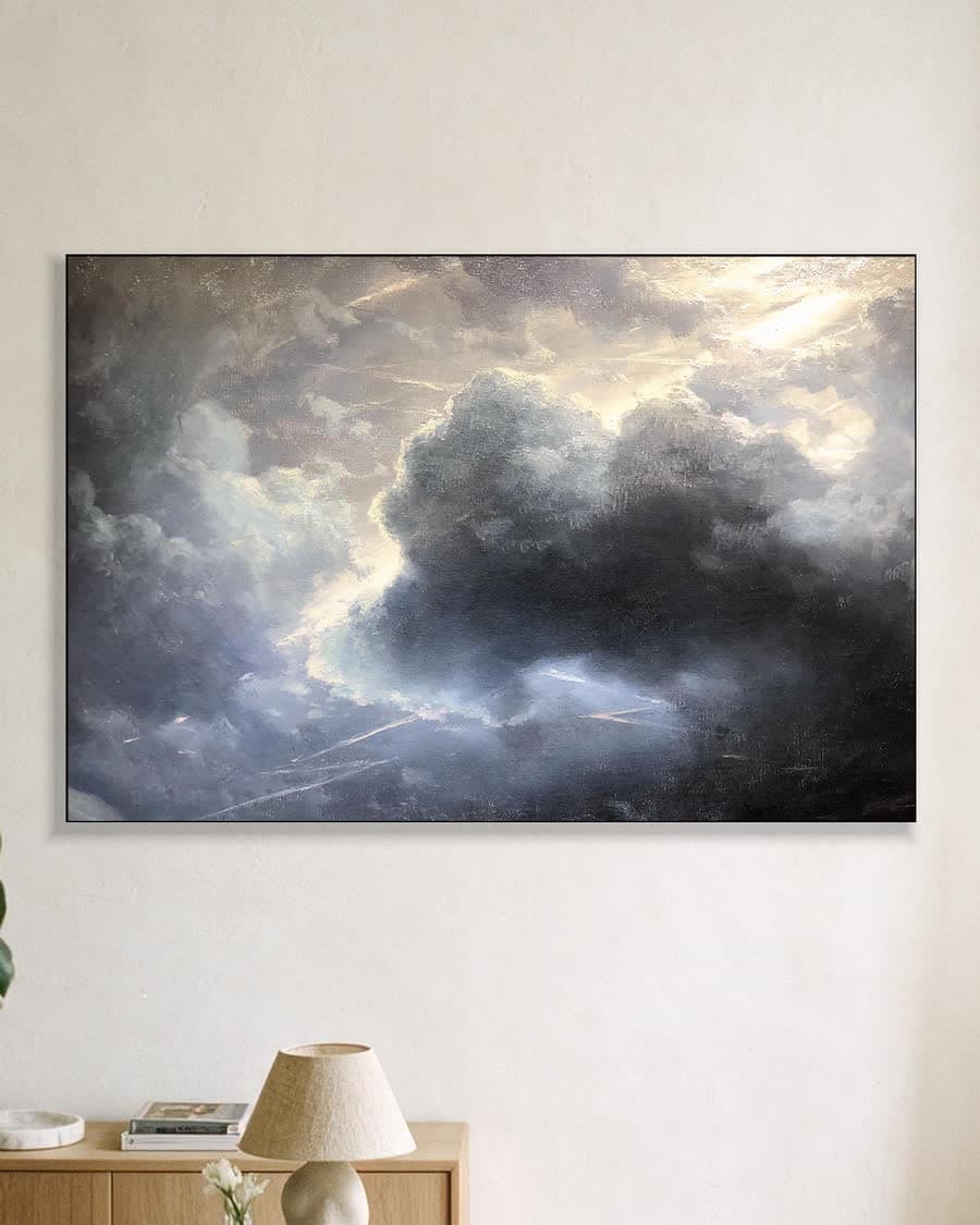 Wolken en bliksem in een aluminium frame aan dezelfde muur