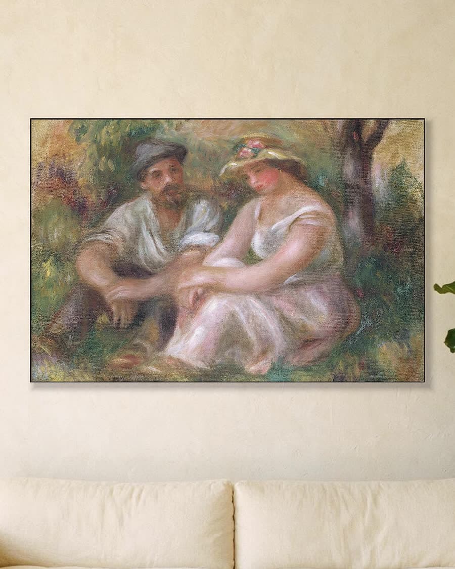 Het gesprek in een aluminium frame aan dezelfde muur