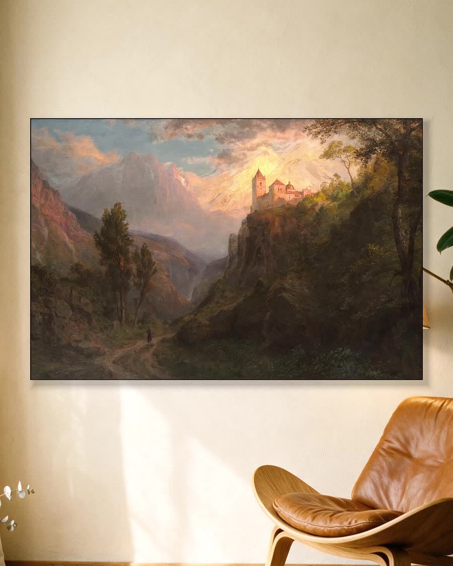 Kasteel in berglandschap in een aluminium frame aan dezelfde muur