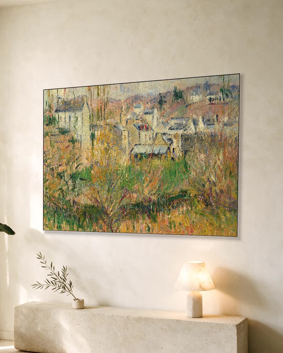 Dorpsgezicht door de bomen in een aluminium frame aan dezelfde muur