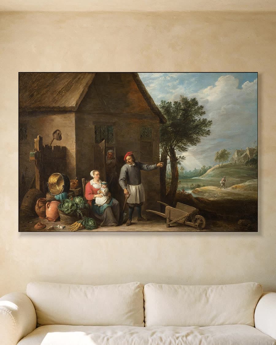Een landman met een vrouw en kind in een aluminium frame aan dezelfde muur