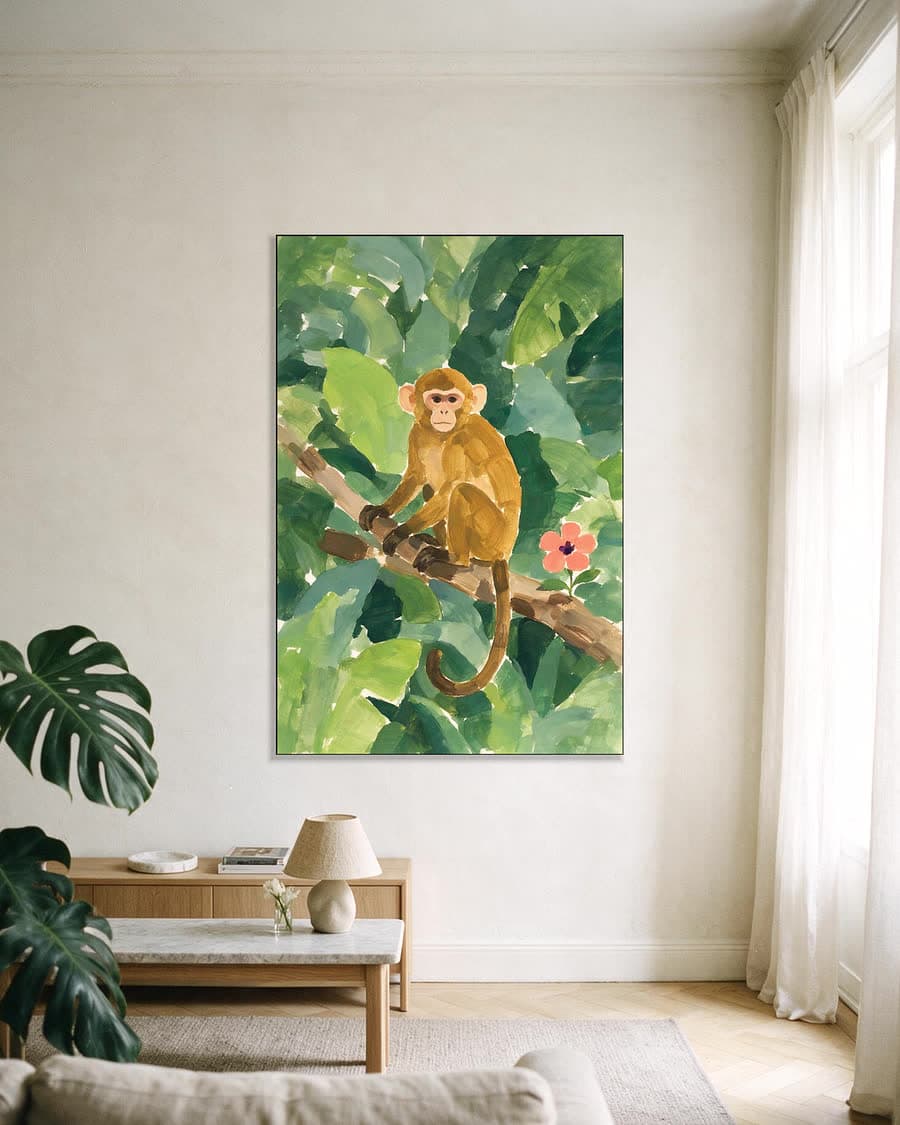 Aapje op een tak in een aluminium frame aan dezelfde muur