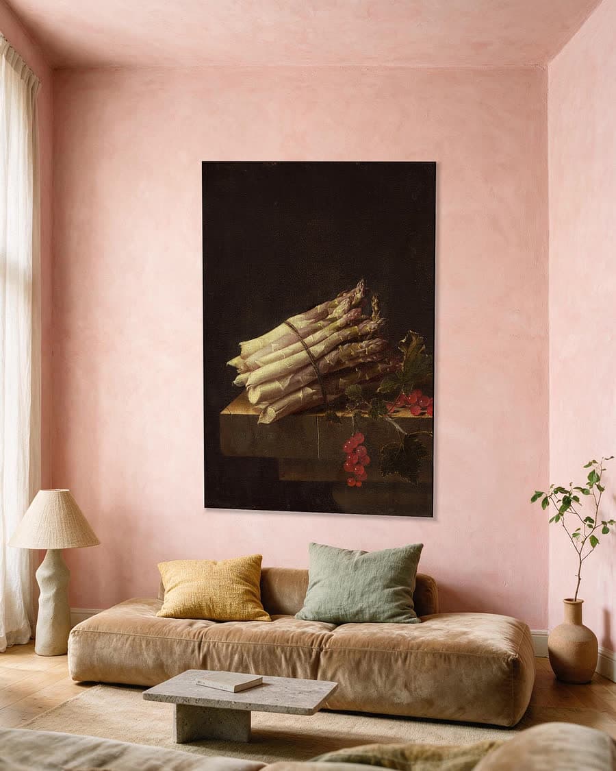 Bundel asperges in een aluminium frame aan dezelfde muur