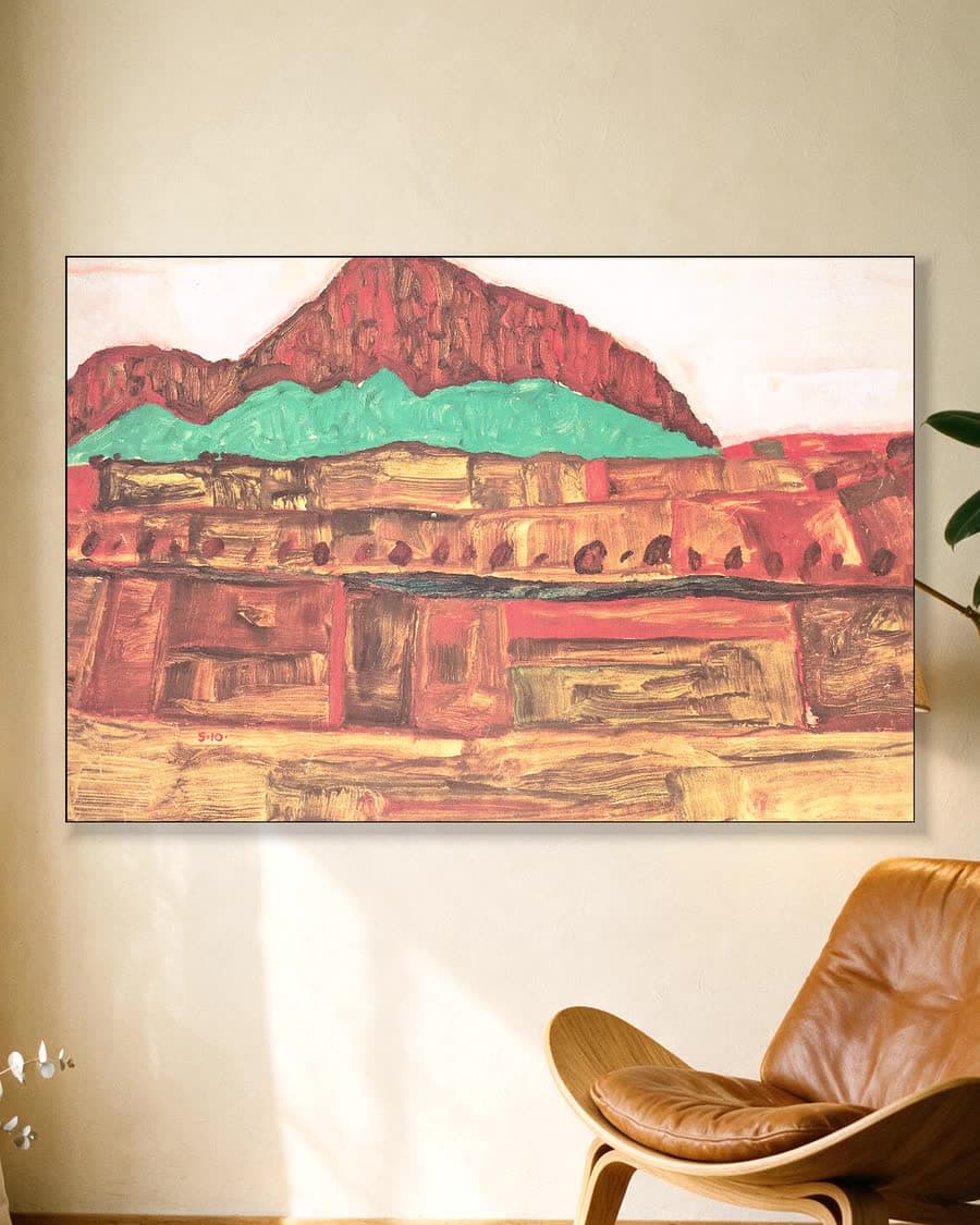 Berglandschap in een aluminium frame aan dezelfde muur