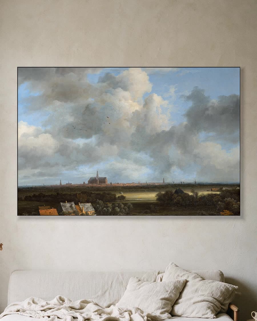 Gezicht op Haarlem met bleekvelden in een aluminium frame aan dezelfde muur