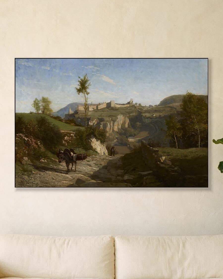 Landschap met ezel en kasteel in een aluminium frame aan dezelfde muur