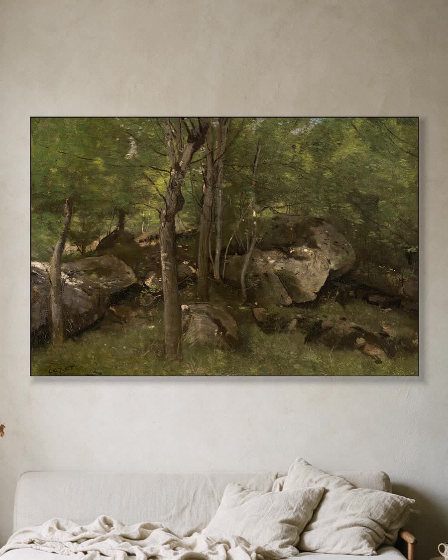 Boslandschap met rotsen in een aluminium frame aan dezelfde muur