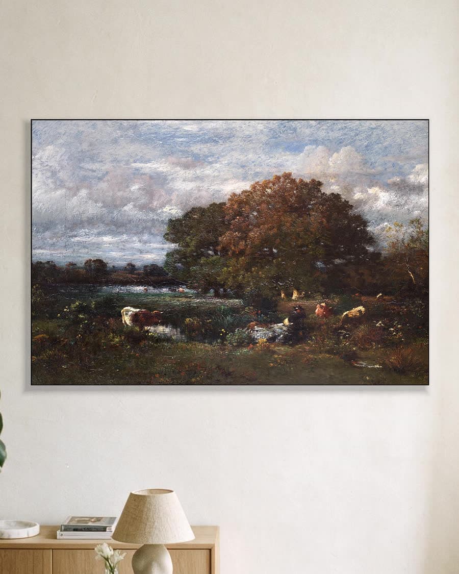 Koeien aan de waterkant in een aluminium frame aan dezelfde muur