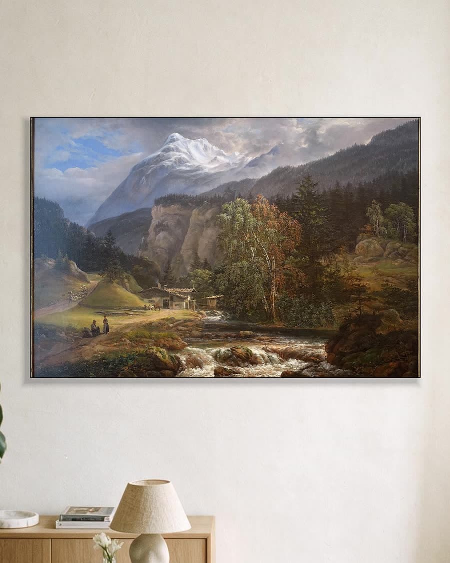 Alpenlandschap in een aluminium frame aan dezelfde muur