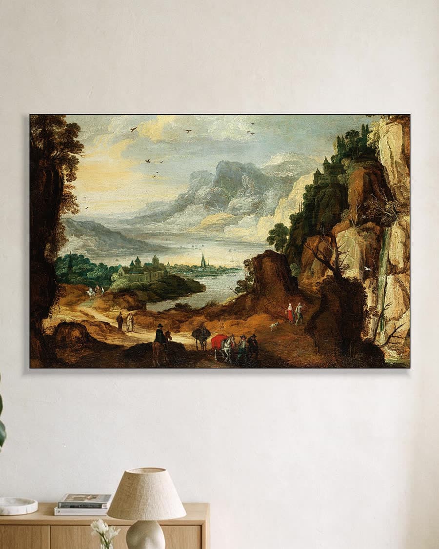 Berglandschap met rivier en stad in een aluminium frame aan dezelfde muur