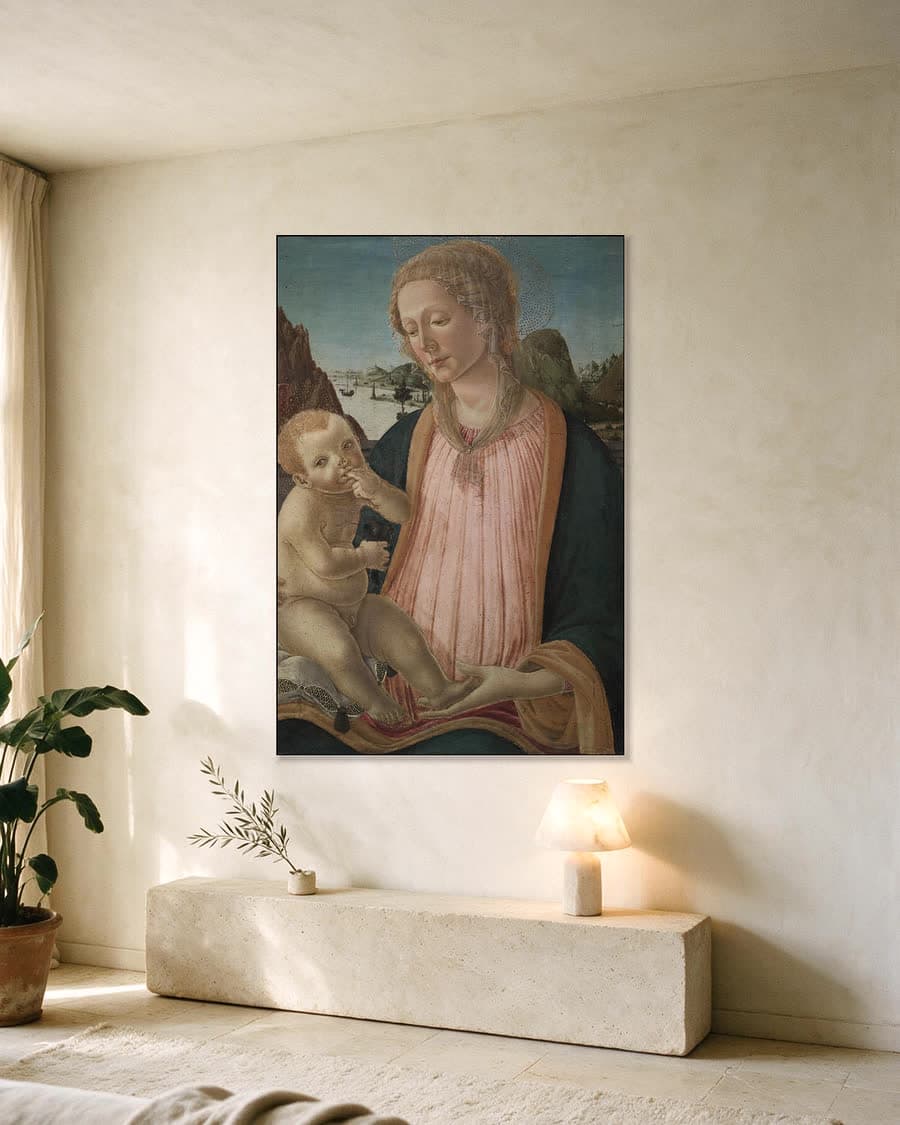Madonna met kind in een aluminium frame aan dezelfde muur