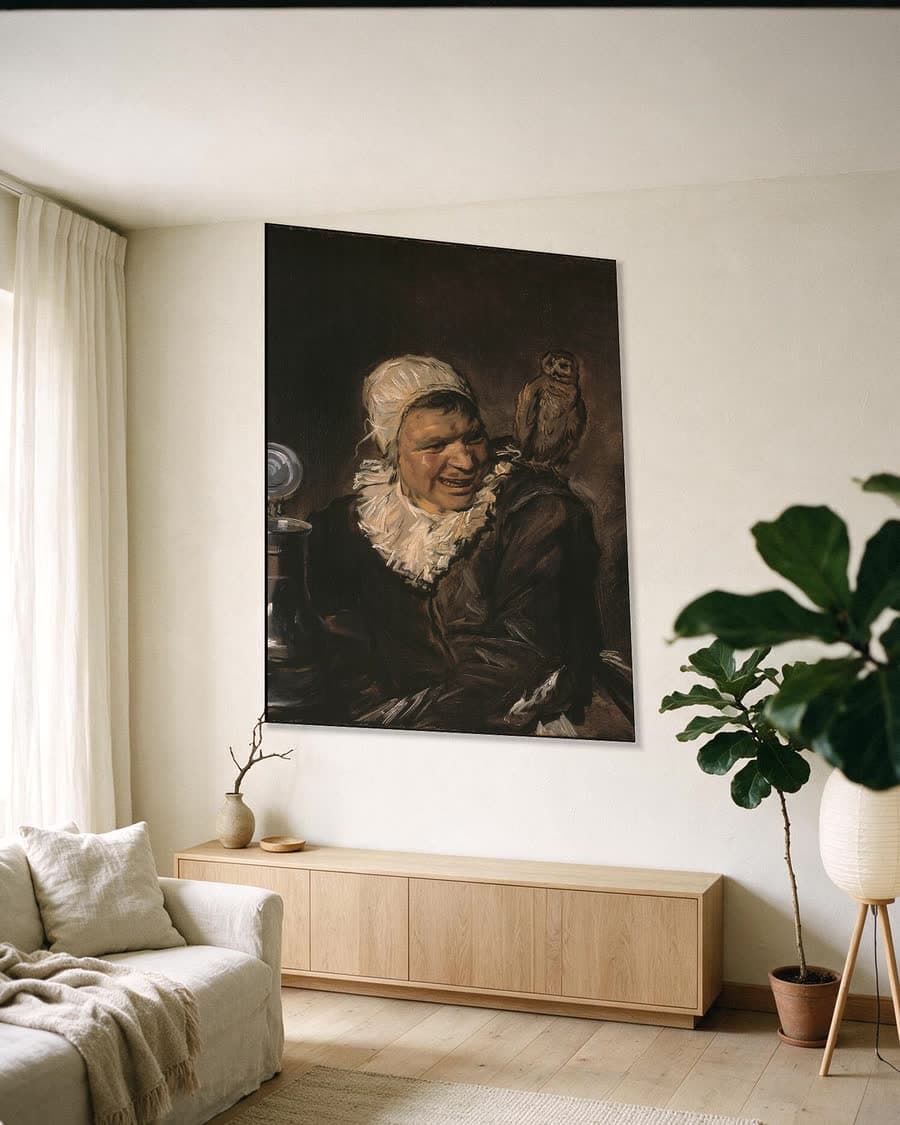 Malle Babbe in een aluminium frame aan dezelfde muur